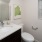 bathroom with a large mirror
