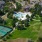 aerial showing property, connected amenities and local area