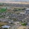 aerial showing property, connected amenities and local area