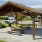 seating outside under wooden cabanas