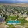 aerial showing property, connected amenities and local area