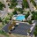 aerial showing property, connected amenities and local area