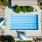 aerial of pool and property showing ample in-water seating