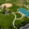 aerial showing property, connected amenities and local area