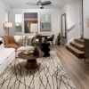 living room with modern couch and decor