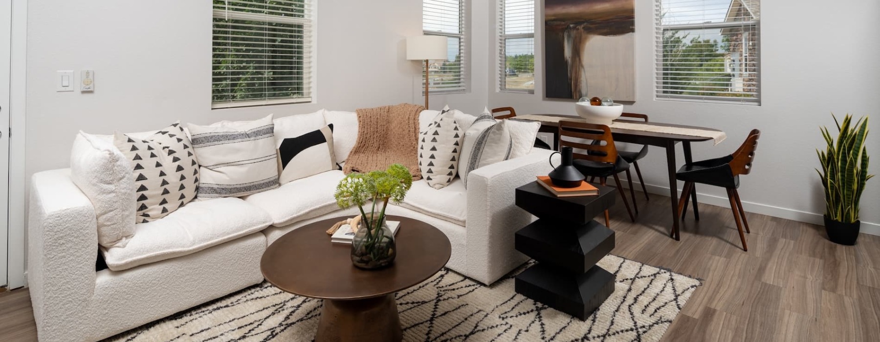 living area that includes ample seating spaces and bright lighting