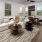 living area that includes ample seating spaces and bright lighting
